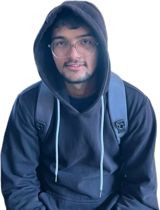 Martin, hoodie up, mid-smile